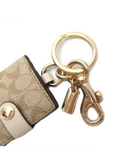 Coach-77675-Frame-Bag-Charm-Signature-Light-Chalk-detail