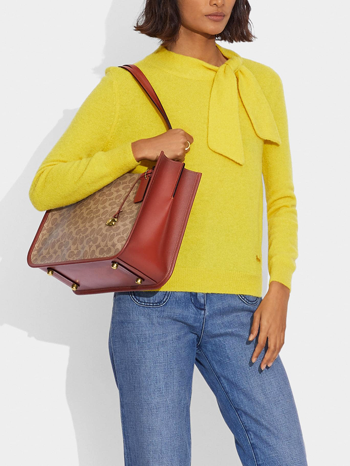 Coach-C2591-Tyler-Carryall-In-Signature-Canvas-Tan-Rust-Balilene-onmodel