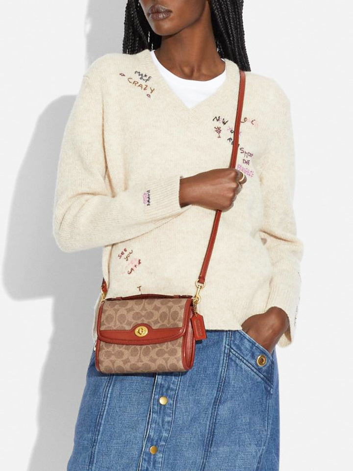 Coach-C4204-Kip-Turnlock-Crossbody-In-Signature-Canvas-Tan-Rust-onmodel