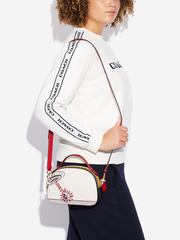    Coach-C6976-Disney-Mickey-Mouse-X-Keith-Haring-Serena-Satchel-Gold-Chalk-Multi-Balilene-onmodel