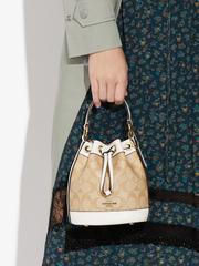 Coach Dempsey Drawstring Bucket Bag 15 In Signature Canvas Gold/Light Khaki Chalk