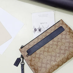 Coach F29508 Carryall Pouch In Signature Canvas Tan