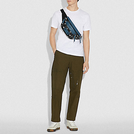 Coach-F72956-Disney-X-Terrain-Belt-Bag-With-Snow-White-And-The-Seven-Dwarfs-Eyes-Print-Black-Multi-Balilene-on-model