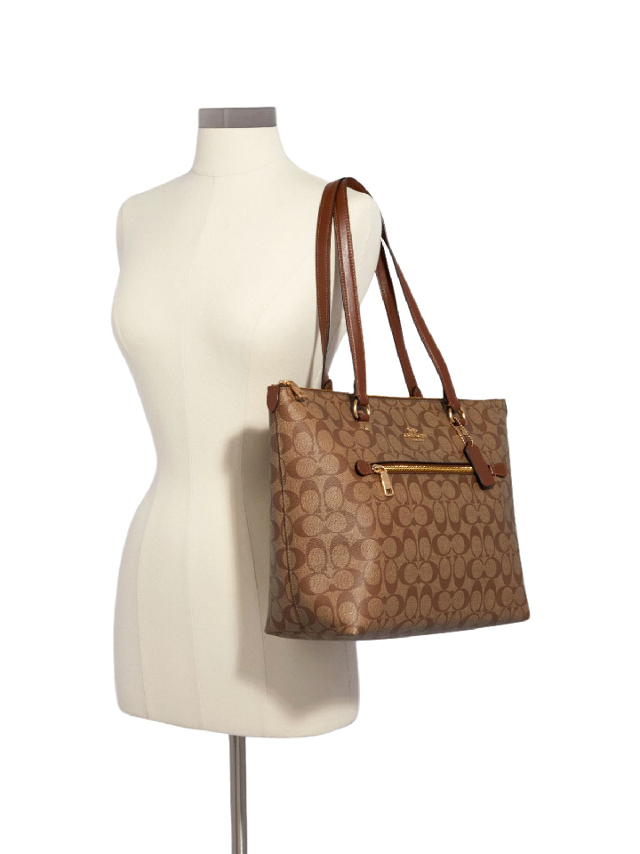    Coach-F79609-Gallery-Tote-In-Signature-Canvas-Saddle-Balilene-onmodel
