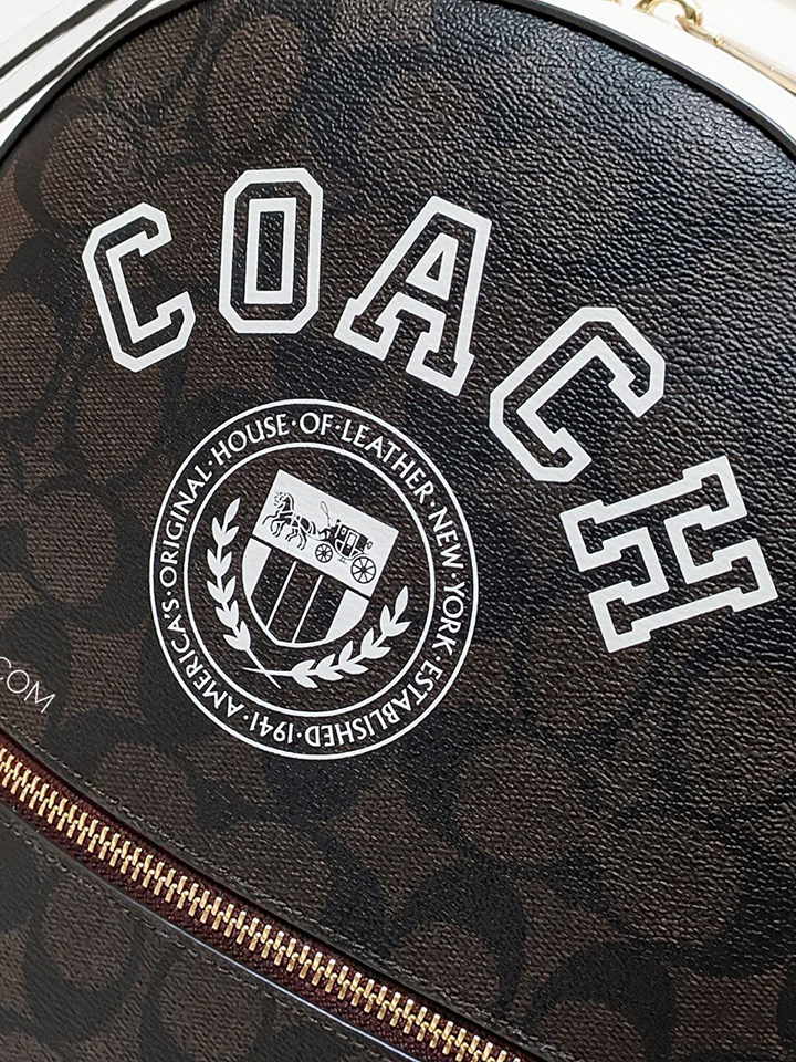 Coach-Jordyn-Backpack-In-Signature-Canvas-With-Varsity-Motif-Brown-Buttercup-Balilene-detail-logo