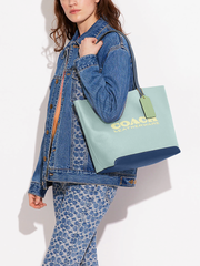Coach-Kia-Tote-In-Colorblock-Aqua-Multi-Balilene-onmodel