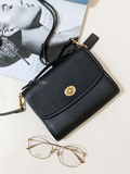    Coach-Kip-Turnlock-Crossbody-Bag-Black-Balilene-detail-depan