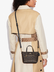 Coach-Mini-Gallery-Crossbody-In-Signature-Canvas-Brown-Black-Balilene-onmodel
