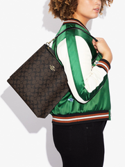 Coach-Mollie-Bucket-Bag-In-Signature-Canvas-Brown-Black-Balilene-onmodel1