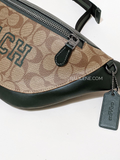 Coach-Warren-Belt-Bag-In-Signature-Canvas-With-Varsity-Motif-Khaki-Amazon-Green-Balilene-detail-samping