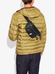 Coach-Westway-Belt-Bag-In-Colorblock-Signature-Canvas-With-Coach-Patch-Charcoal-Amazon-Green-Balilene-onmodel