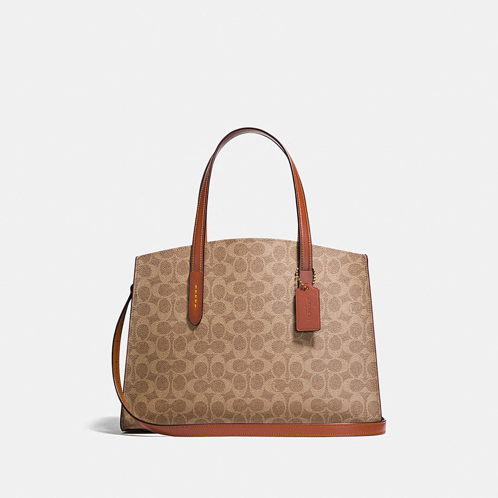 Coach 31210 Charlie Carryall In Signature Canvas Rust