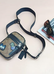 Coach F72951 Terrain Crossbody Signature Disney Patches Tan