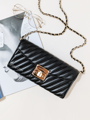 Michael-Kors-Rose-Medium-Elongated-Clutch-Black-Balilene-detail-depan