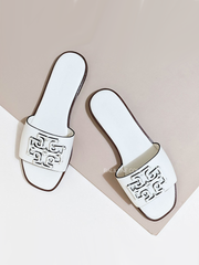    Tor-Burch-Ines-Slide-Textured-Calf-Leather-New-Ivory-Balilene-detail-atas