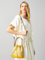 Tory-Burch-79487-T-Monogram-Jacquard-Bucket-Bag-Goldfinch-Balilene-onmodel