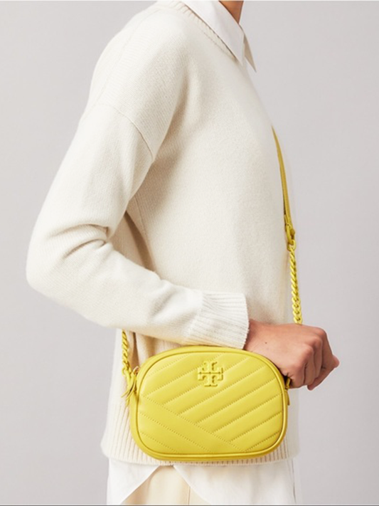 Tory-Burch-82284-Kira-Chevron-Powder-Coated-Small-Camera-Bag-Calendula-Balilene-onmodel