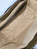 Tory-Burch-85118-McGraw-Embossed-Small-Drawstring-Satchel-New-Olive-Balilene-detail-dalam