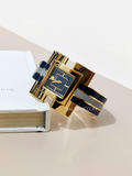 Tory-Burch-T-Bangle-Watch-Gold-Tone-Navy-Stainless-Steel-25MM-Balilene-detail-depan