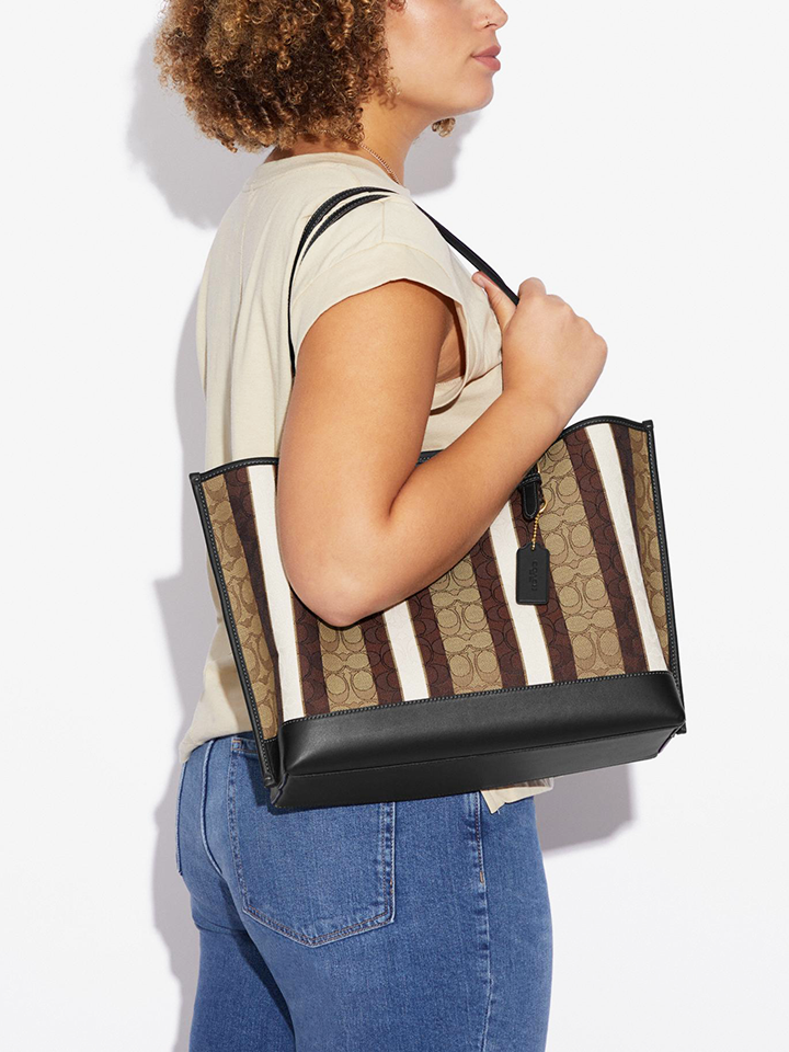 on-model-Coach-Mollie-Tote-In-Signature-Jacquard-With-Stripes-Khaki-Black-Multi