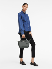 on-model-Longchamp-Le-Pliage-Green-Small-Top-Handle-Bag-Grey